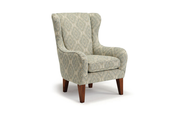 lorette wing chair is a transitional wing chair with rounded arms and back showcasing a grey patterned fabric and riverloom wood finish on the legs