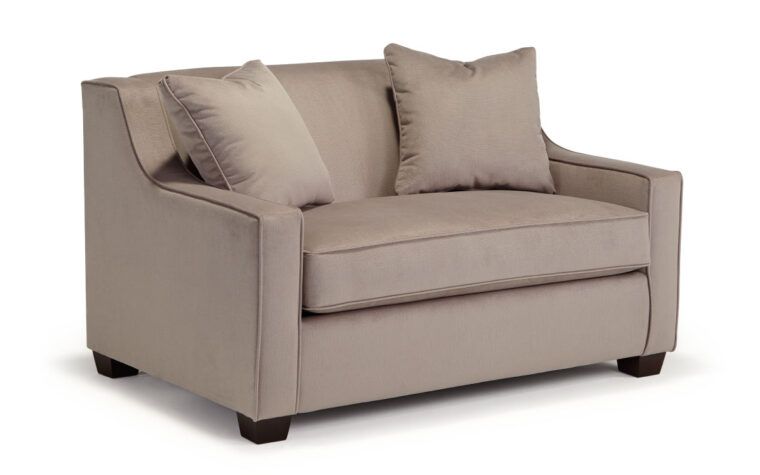 A gorgeous chair and a half that turns into a sofa bed at night