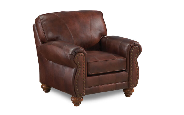 A masculine rustic chair with antique nail heads to outline the front of the chair