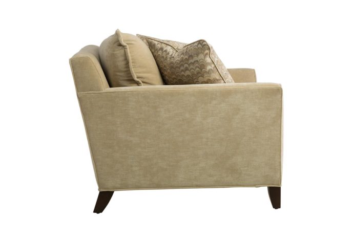 Side shot of the Genevieve chair and a half in tan suede fabric and espresso wood finish