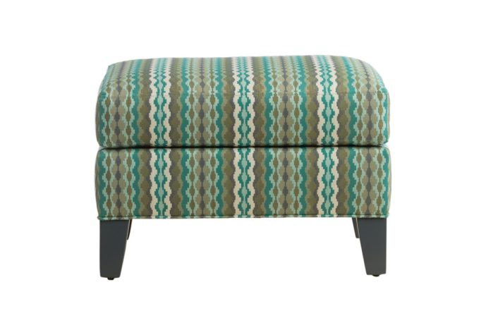 SIde shot of the Aeriel ottoman by Vogel in bright blue, green, and brown striped fabric