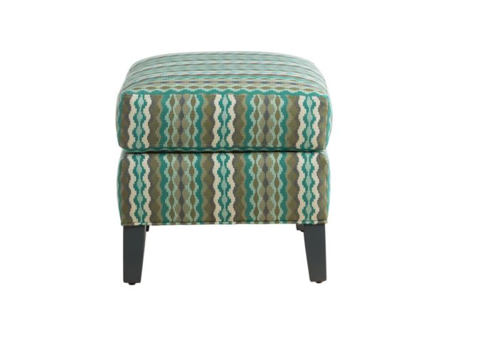 End shot of the Aeriel ottoman by Vogel in bright blue, green, and brown striped fabric