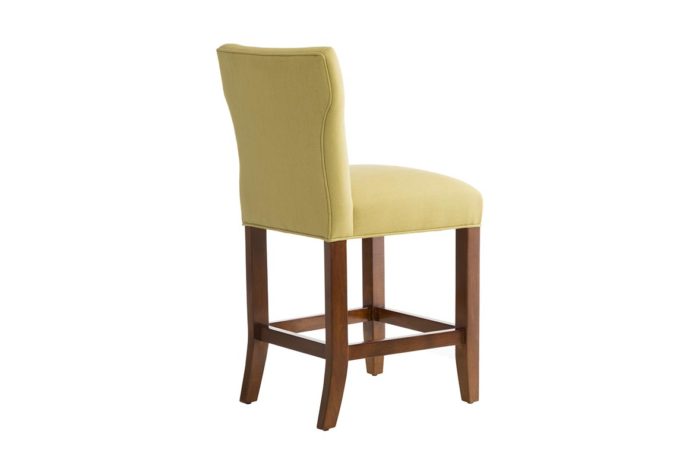 Rear shot of the 10206 counter stool in yellow fabric with pecan wood finish