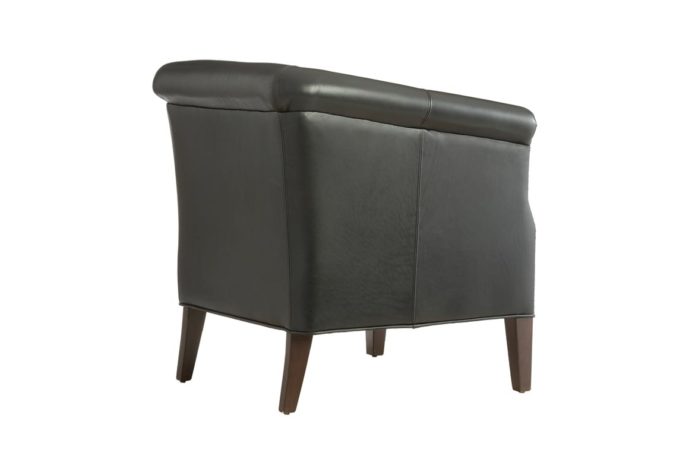 Back shot of the Bernard lounge chair from Vogel by Chervin in black leather with nail head trim and espresso wood finish legs