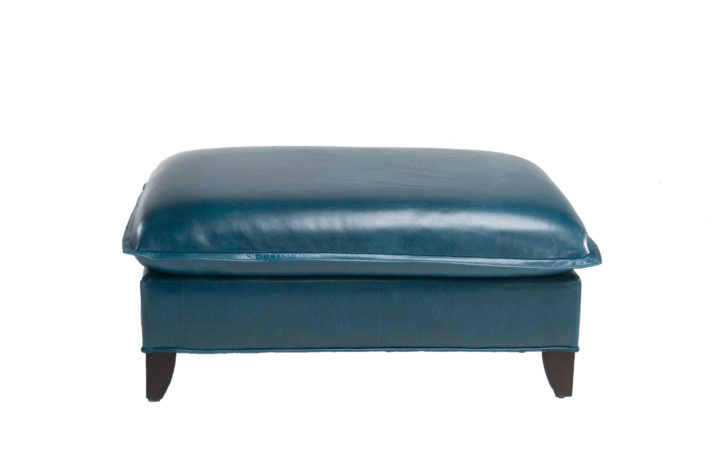 Large blue leather Genevieve ottoman by Vogel with espresso wood finish