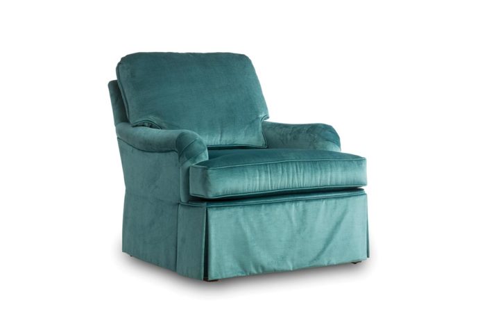 frong angl eof tesssa chair is skirted and shown in a blue velvet fabric