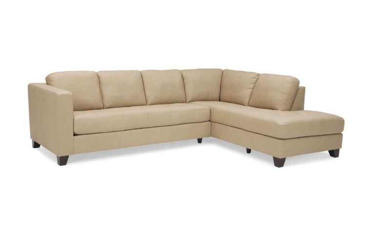 canadian made transitional leather sectional with tufting in a cream leather with dark wood finish