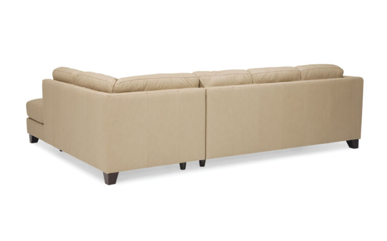 back view of transitional leather sectional with tufting in a cream leather with dark wood finish