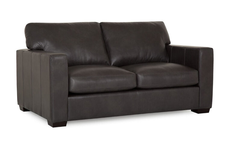 front angle of contemporary black leather loveseat with espresso wood finish