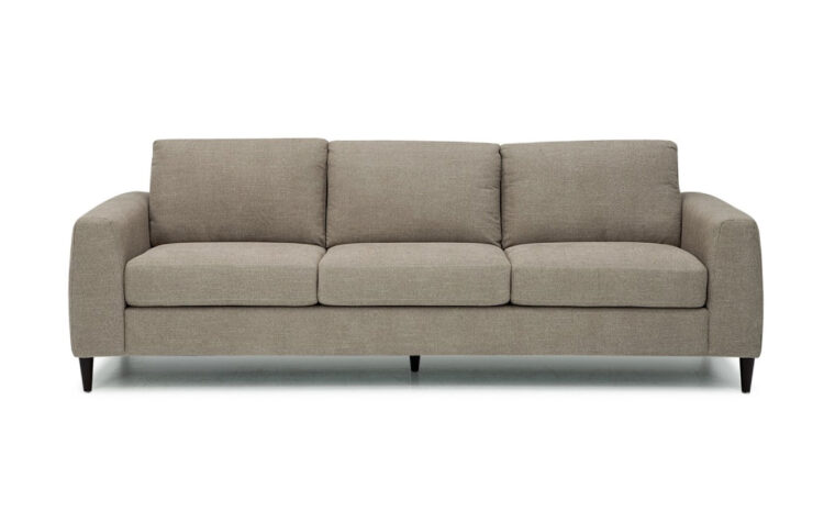 atticus sofa is a mid-century odern sofa with wooden legs and grey fabric