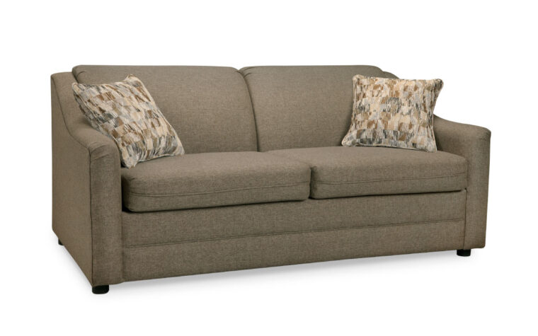 double size raven loveseat hide-a-bed in brown fabric with two throw pillows