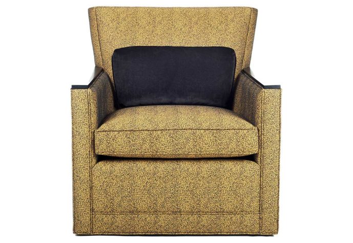 Front shot of the Max Swivel Chair from Vogel by Chervin in a mustard yellow fabric with espresso wood-top arms and a black kidney pillow