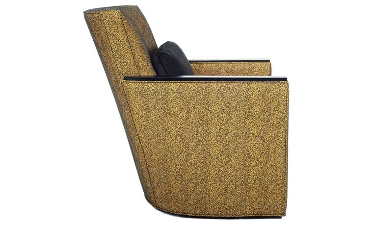 Side shot of the Max Swivel Chair from Vogel by Chervin in a mustard yellow fabric with espresso wood-top arms and a black kidney pillow