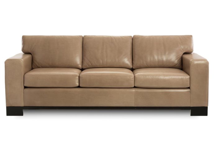 Contemporary Julius sofa from Vogel by Chervin in a tan leather and espresso wood finish