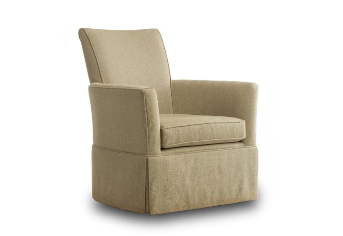 front side angle of a transitional swivel chair with a skirt in tan fabric