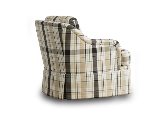 Back shot of the traditional Cassidy swivel chair in a plaid fabric with a skirt