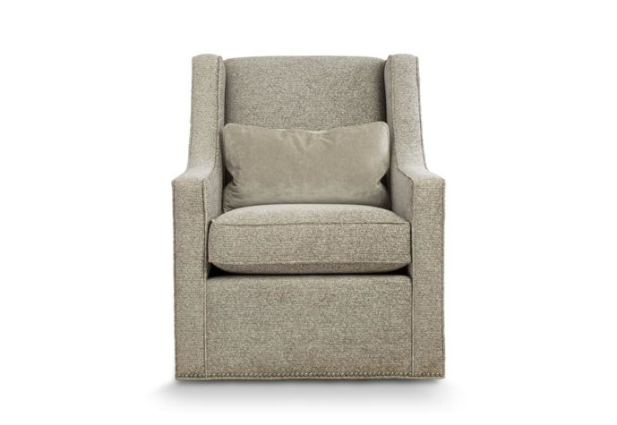 Transitional Eloise swivel chair in beige fabric with metal nail head trim and lumbar pillow in same fabric