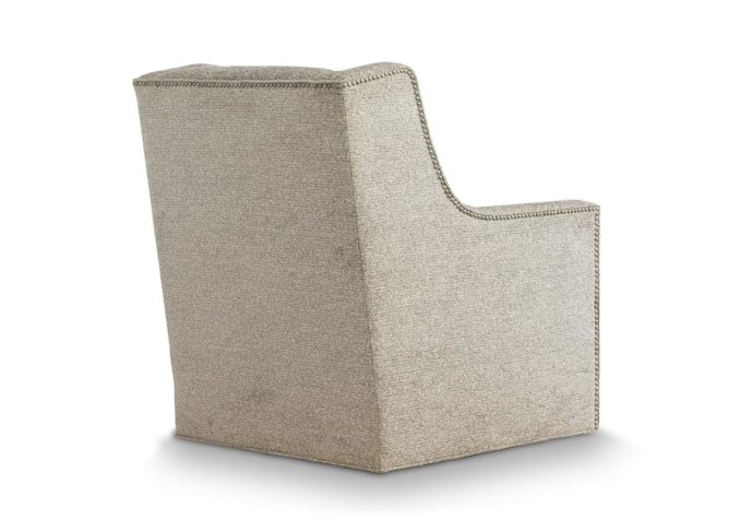 Back view of the transitional Eloise swivel chair in beige fabric with metal nail head trim and lumbar pillow in same fabric