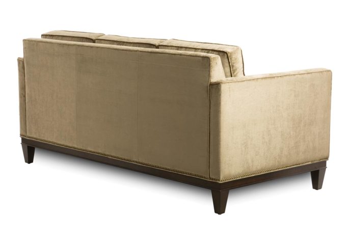back view of 14107 sofa shown in velvet fabric with espresso wood finish and nailhead trim