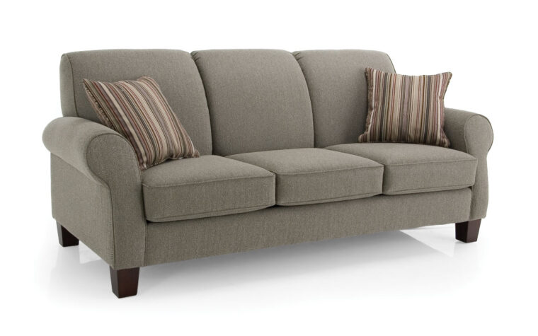 the 2025 is a traditional sofa in charcoal fabric with striped accent pillows