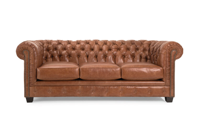 brown leather tufted sofa with rolled arms