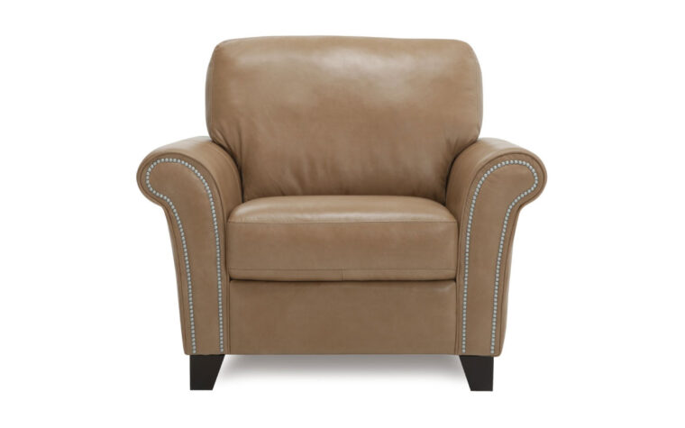 rosebank chair is a relaxed casual club chair in a brown leather with nail head trim and piping on curved arm