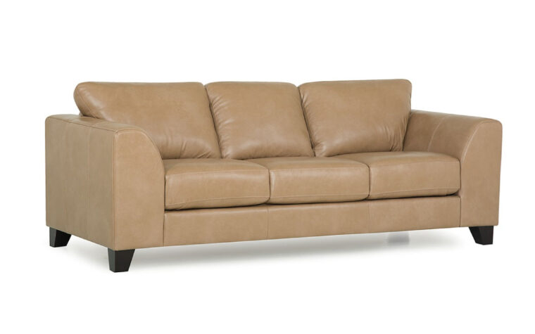 front angle of juno sofa is a contemporary sofa in a tan leather with espresso wood finish