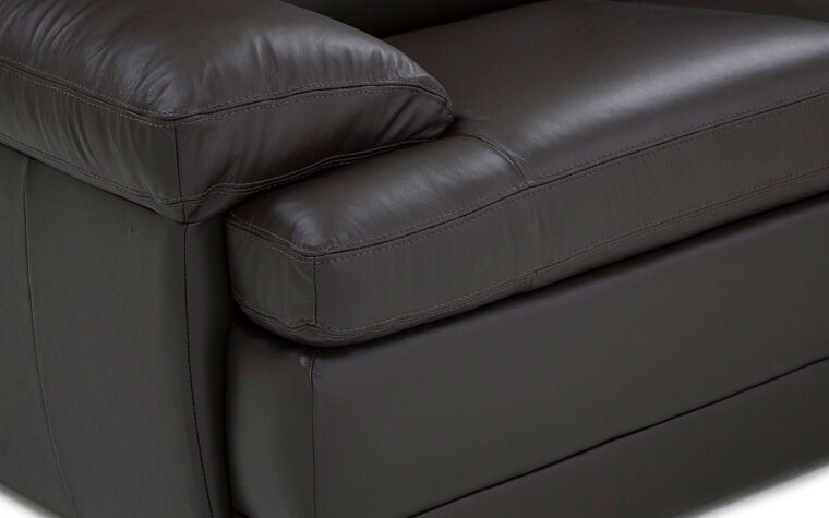 seat details of the northbrook sofa is a relaxed casual sofa in a black leather with espresso wooden legs