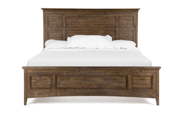 The Bay Creek Queen Panel Bed by Magnussen is constructed from pine veneer and pine solids and has a toasted nutmeg finish.