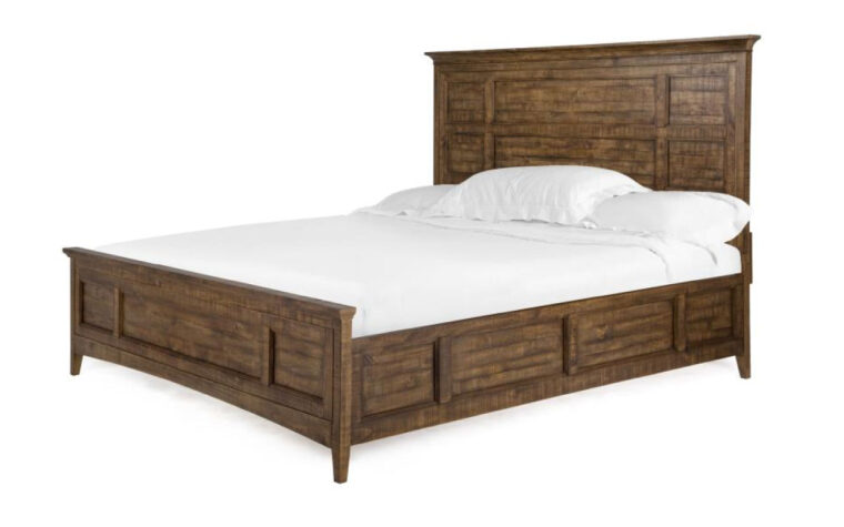 The Bay Creek Queen Panel Bed by Magnussen is constructed from pine veneer and pine solids and has a toasted nutmeg finish.