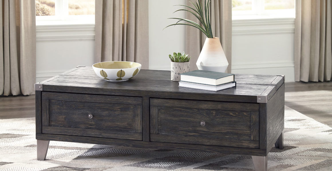 todoe cocktail table has a lift feature, grey distressed wood finish and two drawers with metal looking legs