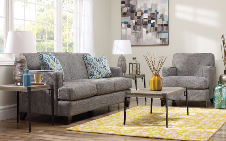 2532 Sofa is a transitional sofa with small amount of button tufting on the back cushion, espresso wood finish on the legs, and a grey fabric