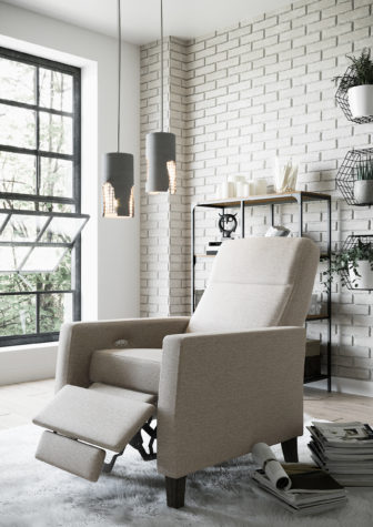 The Bexley Power Recliner Chair from Vogel by Chervin in a cream fabric with espresso legs in a modern white living room
