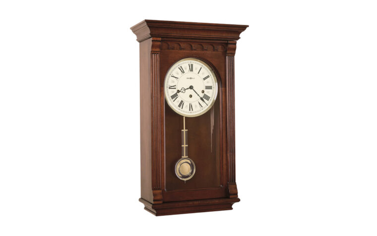 613229 Alcott Wall Clock by Howard Miller - rectangular wall clock in traditional style with round face and exposed pendulum; crown moulding style top
