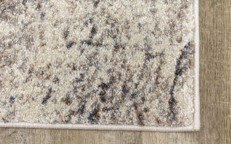 Breeze II Area Rug by Kalora - floor rug with marbled design of cream, black, brown, and teal blue (close-up)