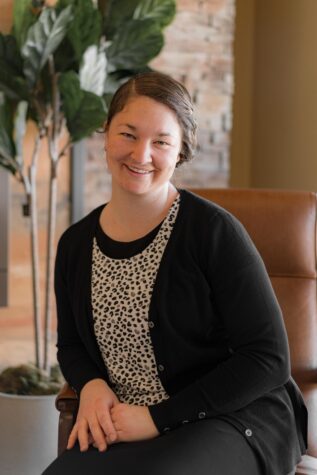 Jody S. sitting in a chair