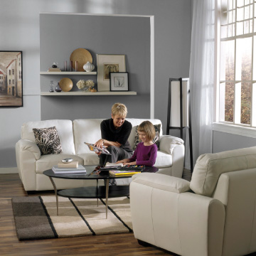 grandma and child playing on sofa