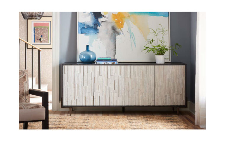 Entertainment console with a black and white composition with texturized doors in living room