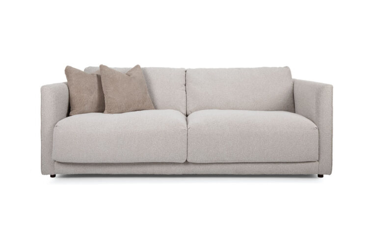 Relaxing lounging sofa with throw pillows for side view