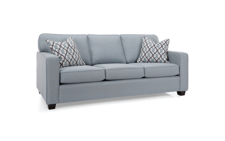 Transitional sofa in a blue fabric with throw pillows