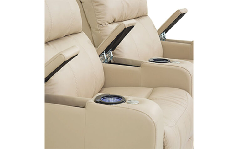 Close up shot of hidden storage compartments in theatre seats