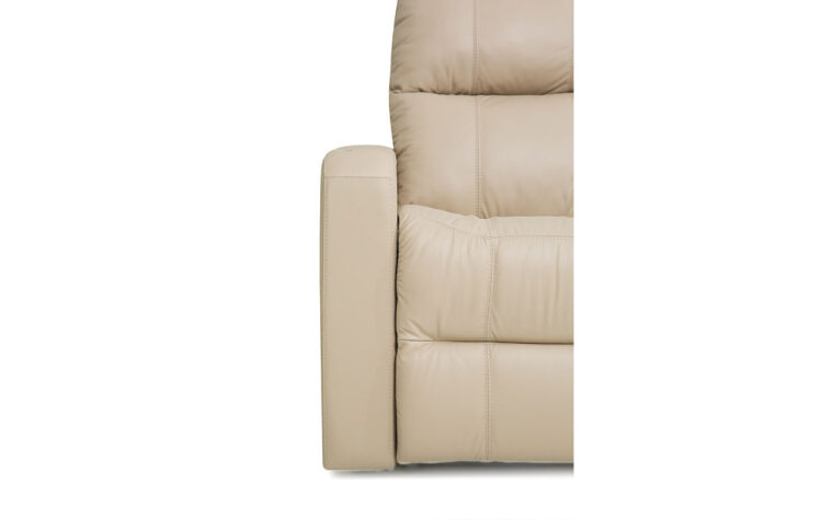 Side view of tan leather upholstered theatre seat