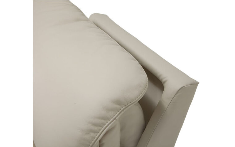 View of reclining back in cream leather upholstery