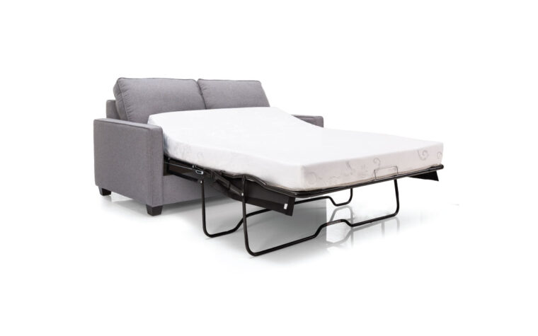 Sofa bed in a grey fabric pulled-out on an angle