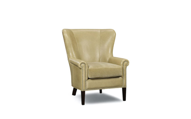 traditional chair with curved arms and back with nail head trim