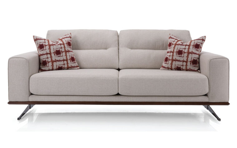 Modern sofa upholstered in a cream fabric