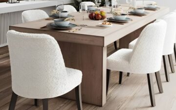 Anastasia chairs by Vogel styled with a modern wood dining table.