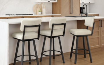 A white and wood kitchen with custom Amisco stools with black metal and white seats . Amisco offers custom furniture in Ontario.