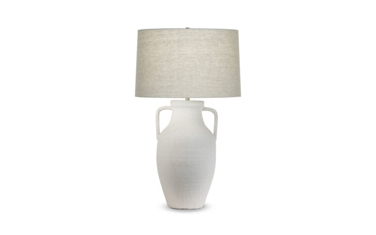 The Delilah Tapered Table Lamp with textured white ceramic base and beige cotton lamp shade