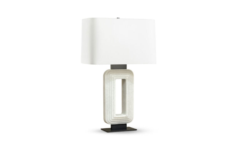 Modern stone table lamp with rectangular ivory composite base with hollow centre and etched pattern